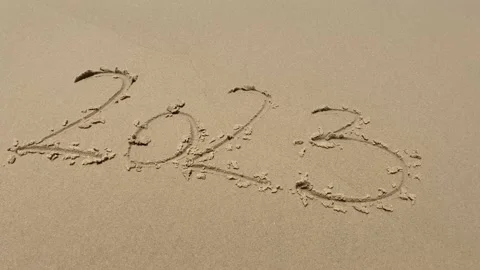 2023 numbers on sandy beach Happy New Year 2023, number hand written. Numbers Stock-Footage 201811423