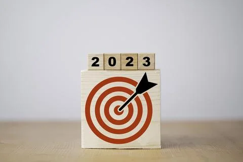 2023 year with target which print screen on wooden cube block for setup bus.. Stock Photos