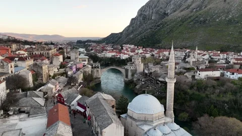 2024-03-19 Forward-moving drone footage of the Mostar Old Bridge Stock Footage 295607091