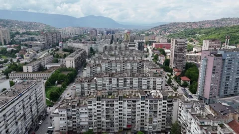 2024-05-15 Forward-moving aerial footage of Sarajevo residential area Stock Footage 295607706
