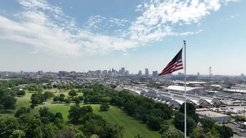 2024-06-14, Baltimore, MD, American flag and Baltimore City in background 스톡 동영상 277516385