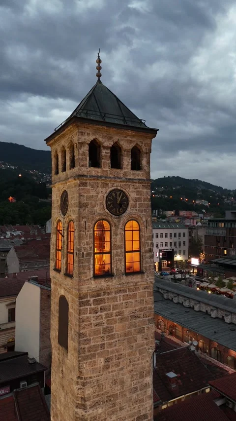 2024-06-25 Vertical Rotating Aerial Footage of Sarajevo Clocktower at Dusk Stock Footage 295046526