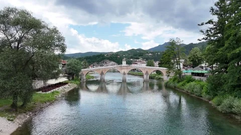 2024-06-28 Forward and ascending aerial shot of Konjic Old Bridge Stock Footage 294951332