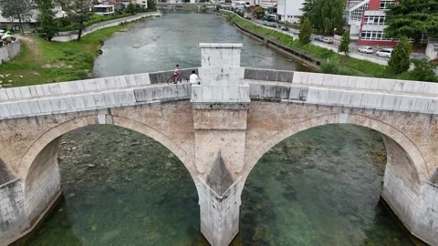 2024-06-28: Reverse Aerial Shot of Konjic Old Bridge, Bosnia Stock Footage 294950401
