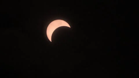 2024 Eclipse traveling through clouds Stock Footage 272151523