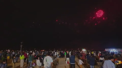 2024 Oct 4. Shanghai, Crowd watching red spiked fireworks burst at night event Stock Footage 333244301