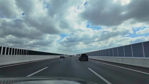 2024 Oct 4. Shanghai, Driving on highway under changing cloudy sky Stock Footage 333298415