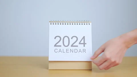 2024 Year Calendar on table background. Happy New Year, Resolution, Goals, .. Stock Footage 252171245