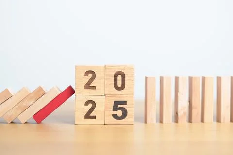 2025 year with falling blocks on table, Risk Management, recession, busines.. Stock Photos
