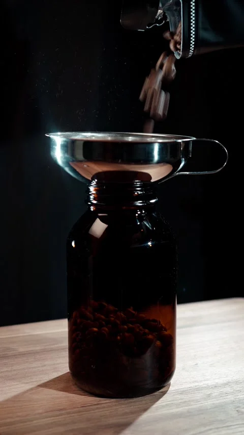20251231 CoffeeBeans FallingIntoJar ASMR DarkStudio 4K.mp4 Stock Footage 325397029