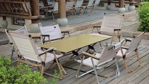 2026 Aug 01, Jiaxing. Empty folding camping table and chairs set Stock Footage 344753123
