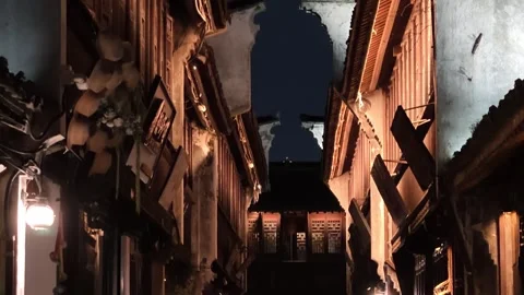 2026 Aug 01, Jiaxing. Forward tracking shot through warm lit historic Stock Footage 344796069