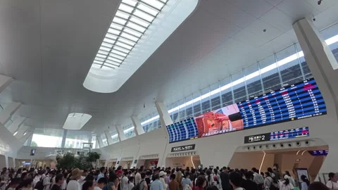 2026 Aug 02, Jiaxing. Crowd of passengers queuing Stock Footage 344799349