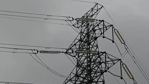 2026 Aug 09, Shanghai. High voltage steel lattice electricity pylon against Stock-Footage 344522460