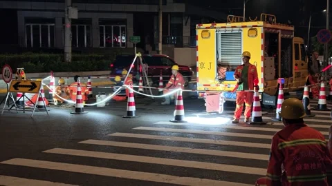 2026 Aug 20, Beijing. Road construction workers pause at night Видео 344840035