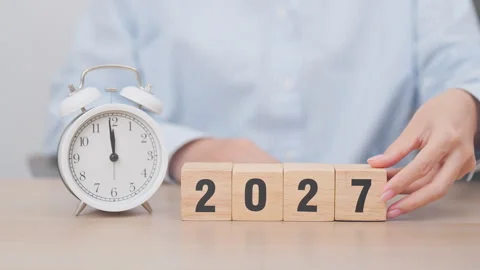 2026 end year to Happy New Year 2027 with vintage alarm clock. Christmas, N.. Stock Footage 341661163