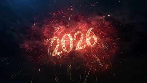 2026 greeting text with particles and sparks on the black night sky Stock Footage 323296261