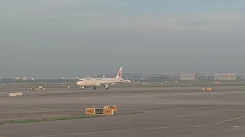 2026 Jul 14, Shanghai. Two China Eastern Jets Taxiing on Airport Tarmac Stock Footage 340454304