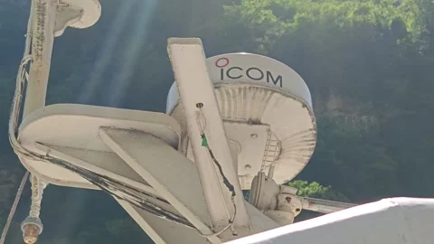 2026 Jul 19, Chongqing. Low angle close-up zoom of weathered ICOM marine radar Stock Footage 342336799