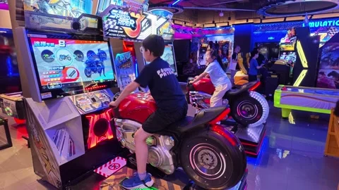 2026 Jun 29, Shanghai. Two preteen kids play Speed Rider 3 Stock Footage 337879995