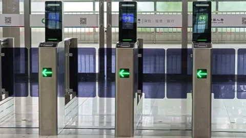 2026 Jun 30, Shanghai. Empty row of stainless steel facial recognition transit Stock Footage 338232236
