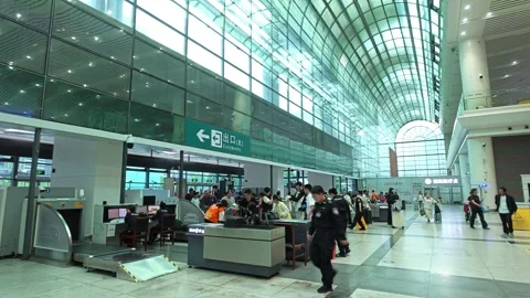 2026 Jun 30, Shanghai. Train station security checkpoint, passengers Stock Footage 338232069