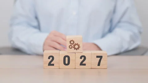 2026 year change to 2027 year block with gear icon. Business Process, Team,.. Stock Footage 346114302