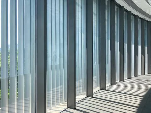 The row of windows in He Art Museum, designed by Tadao Ando. Shunde, Guangdong, China. xkwx architecture, background, beautiful, building, china, construction, contemporary, design, empty, guangdong, hall, he art museum, indoors, inside, interior, landmark, light, modern, nobody, pattern, shunde, structure, tadao ando, windows, woman