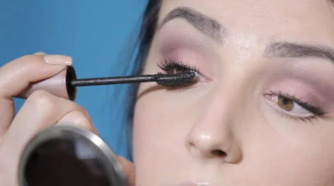 20apply mascara on the eyelashes Stock Footage 62407642