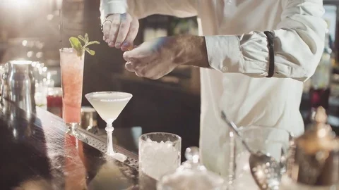 20s bartender is preparing cocktail in a night bar Stock Footage 75233584