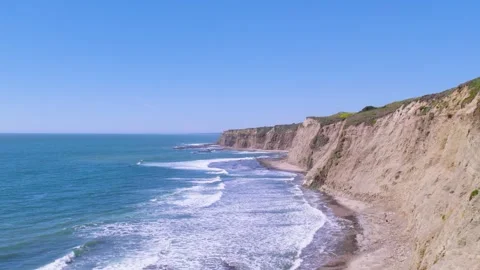 21 Drone flight over beach and cliff. Stock Footage 243408063