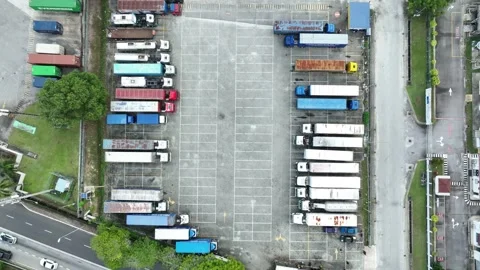 21 June 2025 Shah Alam, Malaysia: truck parking lot Stock Footage 312913341