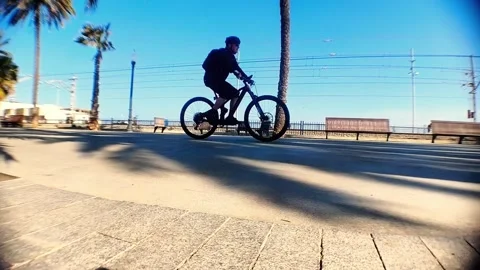 21 March 2026 - Rambla de Badalona Motionlapse People Bicycles and Train Spain Video stock 331216091