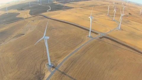 2.135 Fairfield Windmills Flying Forward Over Row of Windmills 000716 Stock Footage 90257573
