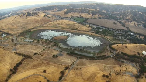 2.149 Vacaville Dropping Elevation Over Lake Near Vacaville 002205 Stock-Footage 90257770
