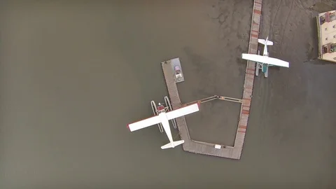 2.159 Sea Plane Port Facing Straight Down Rotating Clockwise Over Sea Planes Stock Footage 90257780