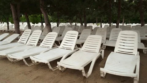 22-07-09 1-1_empty white beach chairs Stock Footage 230149981