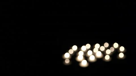 22 moving on the wind candels in blur Stock Footage 61788758