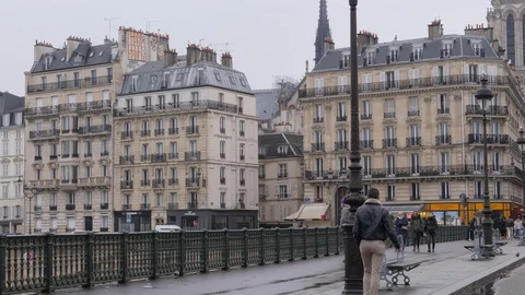 22 Rainy gray winter day Paris beautiful buildings architecture city center Stock Footage 100813964