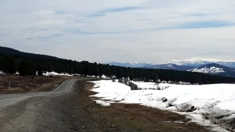 22 snow-covered field high in the mountains, mountain plateau, early spring Stock Footage 264104004