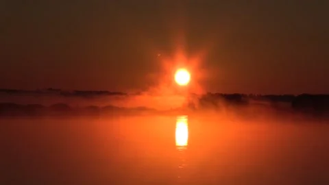 22. Sunset on the river fog approaching Stock Footage 133434863