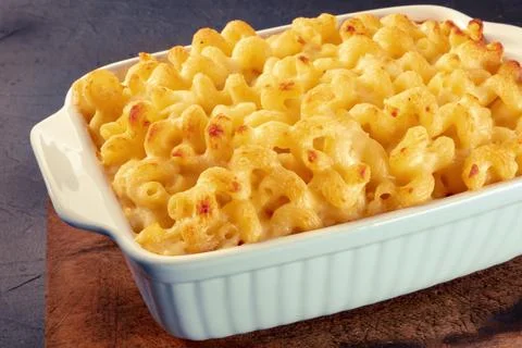 Macaroni  and  cheese  pasta  in  a  casserole,  cheesy  American  dish,  baked  in  the  oven xkwx cheese,  macaroni,  mac,  pasta,  cheesy,  casserole,  sauce,  dish,  cheddar,  american,  gratin,  noodle,  cream,  baked,  crunchy,  food,  table,  rustic,  wooden,  wood,  dinner,  meal,  cuisine,  oven,  classic,  healthy,  kid,  homemade,  gourmet,  lunch,  parmesan,  bake,  mozzarella,  yellow,  pie,  recipe,  dairy,  traditional,  comfort