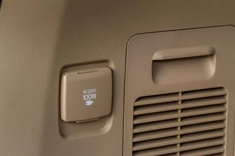 220v power outlet socket in the car. Closed sockets. Stock-Fotos