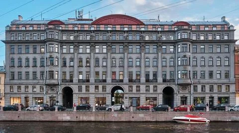 Former profitable house of A. Juen - Business center Mariinsky - Goethe Institute, Moika river embankment, 1913-1914, monument of architecture: St. Petersburg, Russia - October 07, 2022 xkwx profitable house, business center, estate, mansion, culture, historical, Moika river, embankment, building, house, architecture, style, exterior, decor, beautiful, old, city, street, urban, downtown, cityscape, center, interesting place, facade, entrance, view, St. Petersburg, russia, design, architectural, construction, real, landmark, architectural monument, travel, arch, retro, attraction, autumn, evening, boat, granite