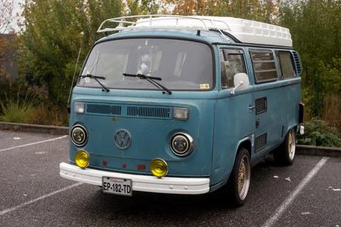 Mulhouse  -  France  -  13  November  2022  -    Front  view  of  blue  Volkswagen  van  parked  in  the  street xkwx volkswagen,  van,  vw,  blue,  adventure,  aged,  antique,  auto,  automobile,  automotive,  brand,  bus,  camper,  car,  classic,  design,  emblem,  europe,  freedom,  front,  german,  germany,  history,  logo,  minivan,  model,  motor,  old,  outdoor,  parked,  retro,  road,  rustic,  sign,  street,  style,  symbol,  tourist,  transport,  transporter,  travel,  truck,  urban,  vacation,  vehicle,  vintage,  volkswagen  camper,  volkswagen  van