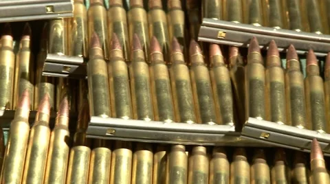 223 bullets in stripper clips pan across right to left Stock Footage 48870184