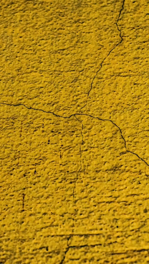 223_Yellow cracked wall texture pattern.mp4 Stock Footage 347072824