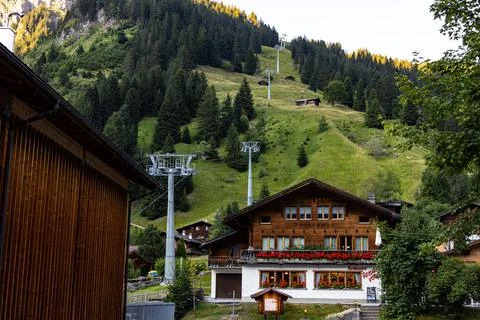 Cable car to Lake Oeschinen in SWITZERLAND EUROPE - - KANDERSTEG, SWITZERLAND EUROPE - JULY 14, 2022 xkwx nature, lake, switzerland, blue, landscape, kandersteg, sky, water, mountain, swiss, scenery, outdoor, tourism, green, europe, view, alps, oeschinensee, travel, rock, hiking, holiday, beautiful, bernese, scenic, scene, tree, stunning, background, oeschinen, idyllic, oberland, range, natural, hilly, rocky, panorama, amazing, photo, place, journey, majestic, turquoise, wanderlust, wonderful, alpine