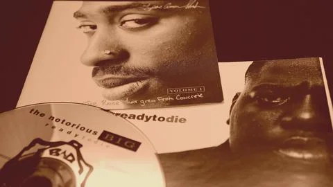 Rome, Italy - March 16, 2019: Collection of covers and cd inserts of the singer Tupac Shakur and NOTORIUS BIG. Protagonists of the battle between the opposing factions of the hip hop of the 90s xkwx new york, los angeles, gangsta rap, big, 2pac, actor, arts, celebrities, celebrity, city, concert, creative, culture, entertainment, event, fame, famous, fashion, glamour, hip hop, hiphop, hollywood, live, music, nightclub, old school, outlaws, outlawz, paramount pictures, people, person, popular, premiere, rap, star, street, style, success, successful, talent, trendy, tupac, tupac shakur, urban, well-known