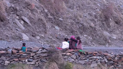 23-04-24, Children's View of Passing Vehicles in Himachal's Scenic Landscapes Stock Footage 273545327